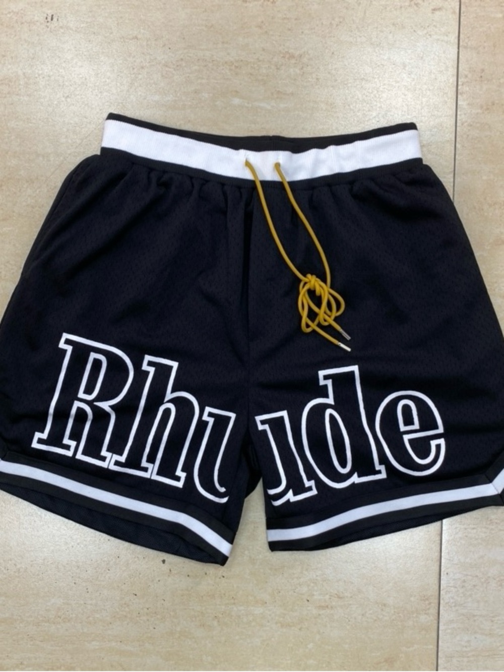 Rhude Black Basketball Shorts with White Trim and Yellow Drawcord